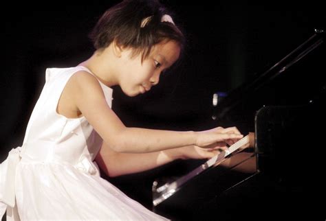 as 8 year old rachel zhang s fingers touched the piano she began with a rather simple rendition