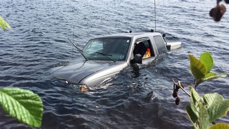 truck crashes  nova scotia lake sends  year   hospital