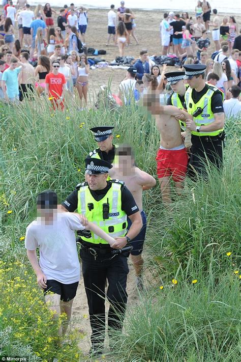 ayrshire teenagers force families off scottish beach as