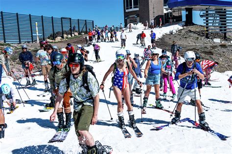 huge crowds mob tahoe   festive speedo clad close  ski season
