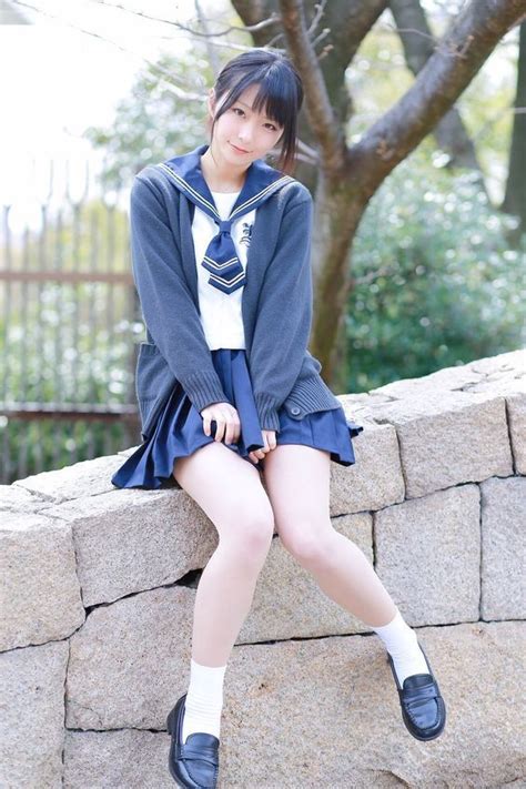 Asian School Girl Sitting On Stone Wall Utsukushii Yume
