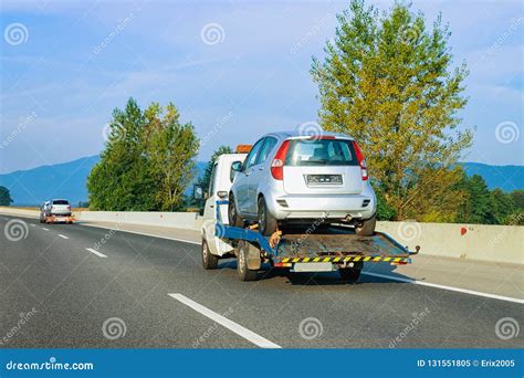 tow truck transporter carrying car  road stock image image