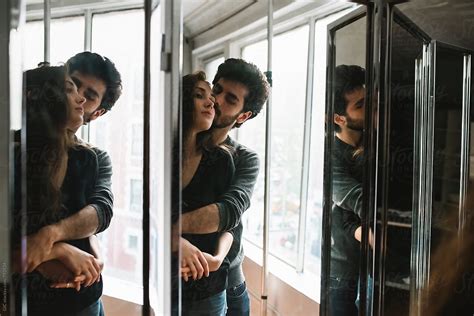 Couple In Front Of The Mirror By Stocksy Contributor Simone Wave