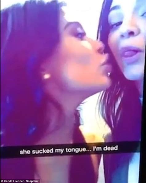 kendall jenner slips her tongue into kylie s mouth in