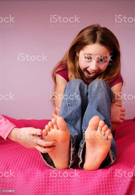 girls tickled feet
