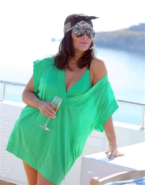 photos kris jenner new wig shades and bandana while jet skiing in greece
