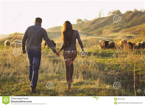 Couple Holding Hand In Hand Romantic Walk On The Autumnal