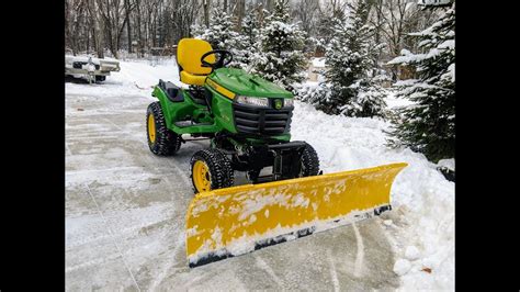 move snow  style snow plowing    john deere  tractor
