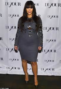 kim kardashian proudly displays her pregnancy curves in bejewelled figure hugging dress and says