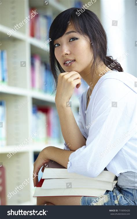 beautiful chinese college girl wearing telegraph