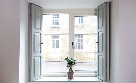 white timber window featuring traditional timber shutters casement windows windows timber