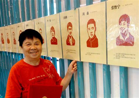 deng rongrong with her latest cutpaper album at xiamen olympic museum in fujian province