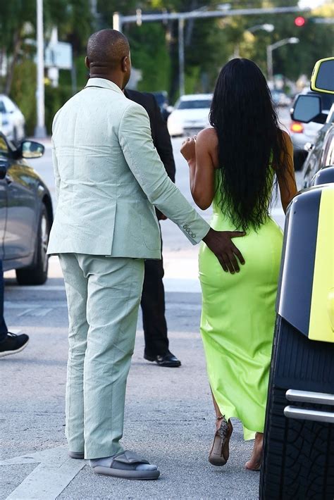 kim kardashian gets a helping hand from her man kanye west