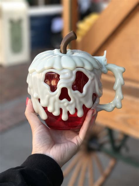 you can stay hydrated with snow white poison apple mugs disneyland