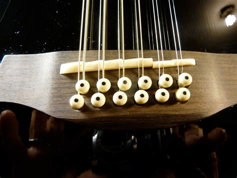 daily guitar repair     intonate   string acoustic guitar