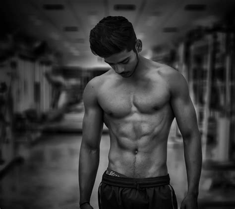 lean body abs black and white aperture iso shutter speed chest bisep
