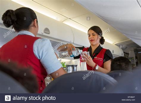 Mexico City Mexico Flight Attendants Serve Drinks On An