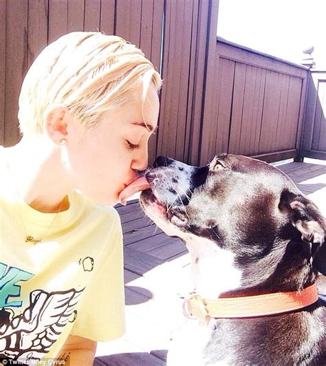miley cyrus sits topless as she gets blonde hair trimmed in revealing flashback post daily