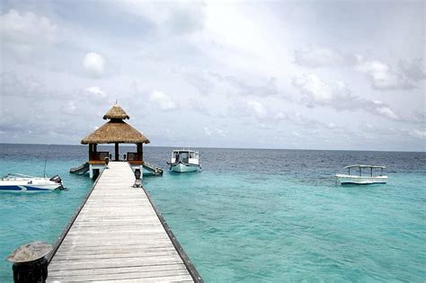 beach resort pier ocean tropics baa atoll sea seascape shore