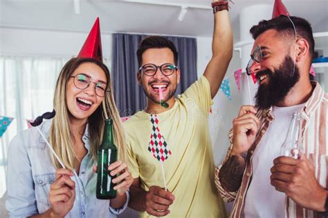 happy people celebrating birthday  friends  smiling    party stock photo