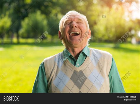 elderly man laughing image photo  trial bigstock