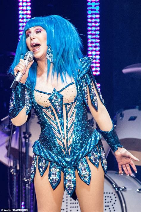 Cher 73 Sizzles In Electric Blue Wig And Leggy Sequinned Leotard