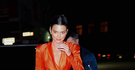 kendall jenner cheekily flashes bare boobs before strutting into ny party in thigh skimming