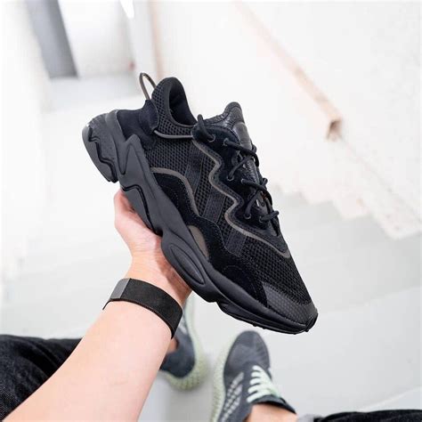 adidas ozweego og triple black sale price  retail   shipping  code friends