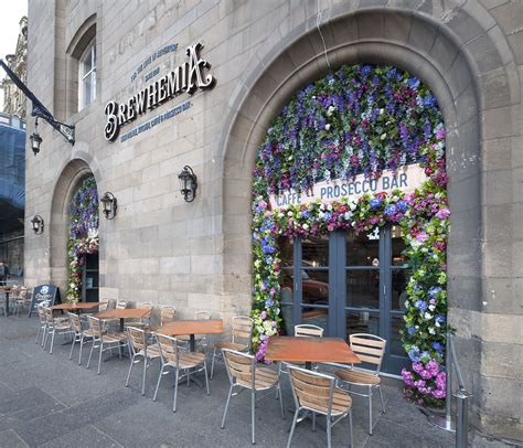 stunning floral entrance arches helped turn  restaurant