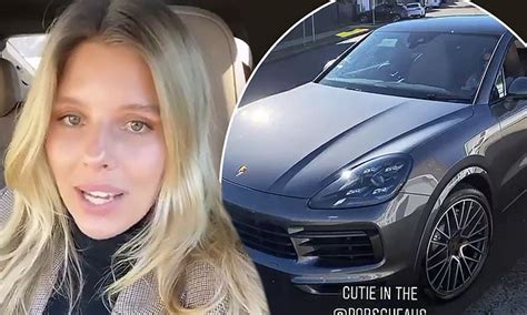 natasha oakley poses inside her porsche while parked in a bus zone