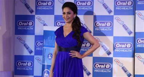 madhuri dixit launches oral b s revolutionary new toothpaste