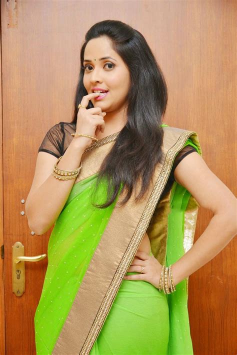 telugu tv anchor anasuya hip navel show in green saree tollywood stars
