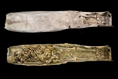 archaeologists open  mysterious lead coffin  buried  feet    grave