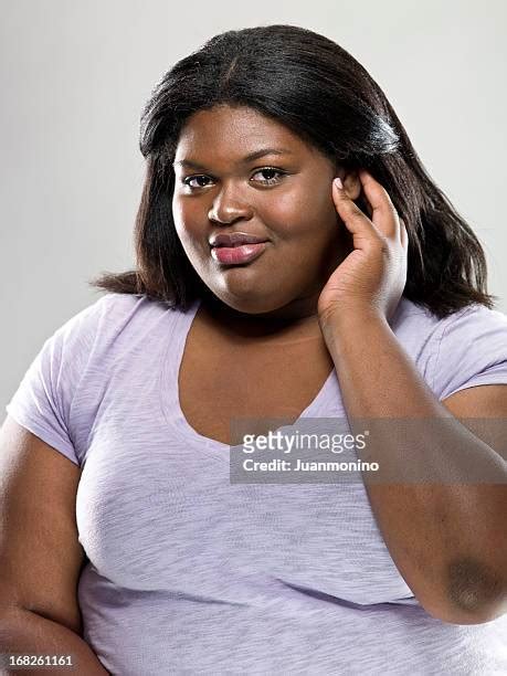 Black Woman Close Up Smirk Photos And Premium High Res Pictures Getty