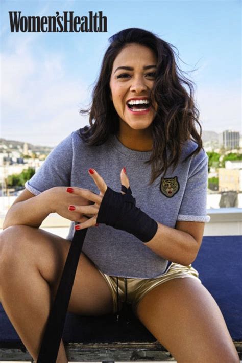 gina rodriguez takes the plunge in red bathing suit and strikes boxing stance as she talks about