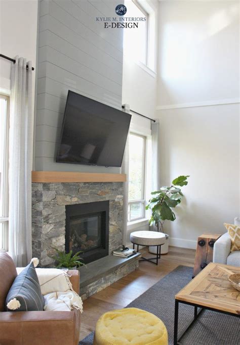 living room stone fireplace shiplap tv tall ceilings benjamin