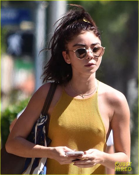 sarah hyland dons mustard yellow halter dress while out in