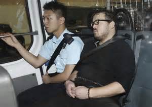 british banker charged in hong kong double killing ny