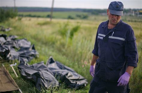 Bodies Are Removed From Mh17 Crash Site Under Rebel Watch Wsj