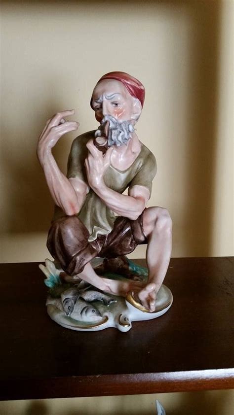 ceramic figurine   man smoking pipe artifact collectors