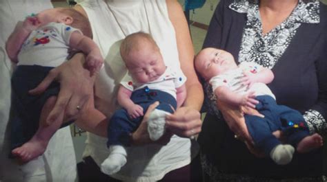new york woman gives birth to rare identical triplets