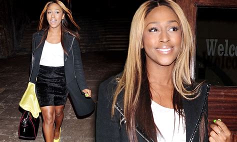 Alexandra Burke Opts For Bright Footwear And Coordinated Coat As She