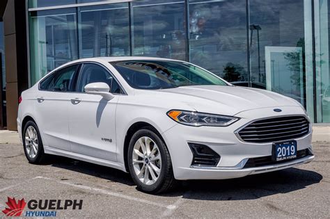 pre owned  ford fusion hybrid sel