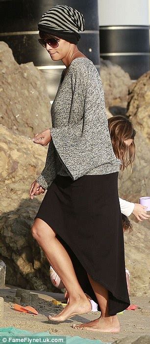 halle berry takes pyjama clad nahla for playtime on the beach daily mail online