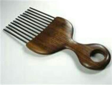 pin  carolyn bridges brown  afro picks  fros afro comb natural hair puff hair puff