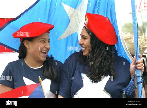 Women Age 17 Carrying The Puerto Rican Flag In Cinco De Mayo Parade St
