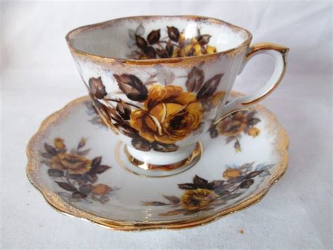Vintage Tea Cup And Saucer Yellow Flowers Gray Leaves Gold Trim