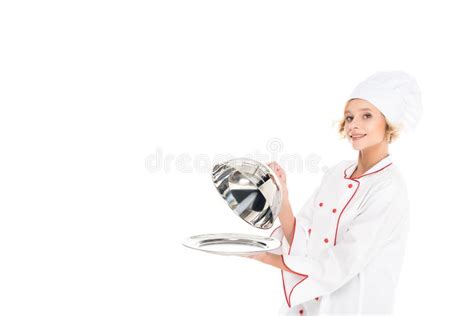 portrait of chef covering eyes with doughnuts and sticking