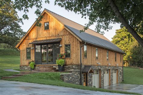 barn home features open living space    car garage