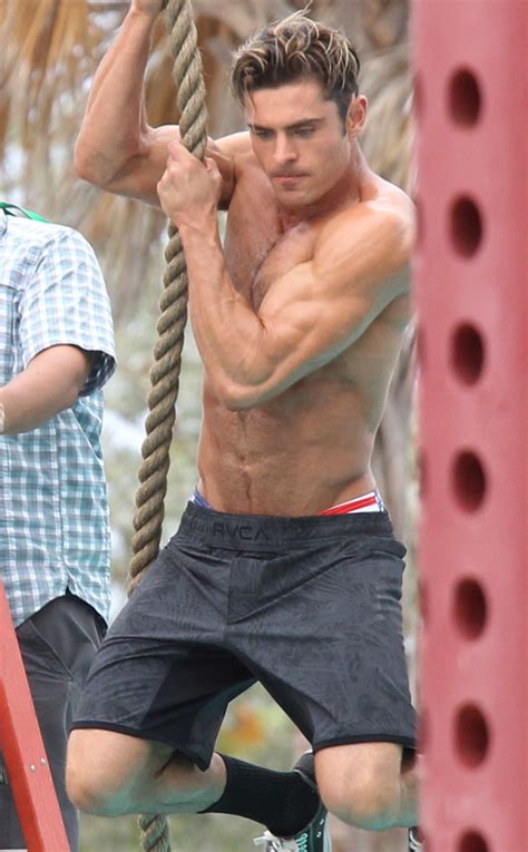 zac efron shows shirtless body on baywatch set and it s almost too hot